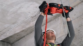 Hilti cordless band saw cutting overhead